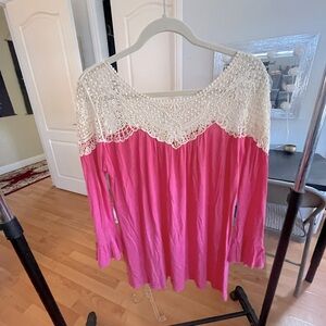 Super cute T-shirt tunic top with crochet detail and bell sleeves. Size M.